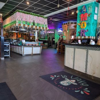 La VaKa Mexican Restaurant - Inside showing Taco bar in the center - Mexican Near Me - Goffstown, New Hampshire La VaKa Mexican Restaurant - Inside showing Taco bar in the center - Mexican Near Me - Goffstown, New Hampshire