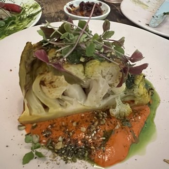 Somebody People - c a u l i f l o w e r roasted served on a moroccan harissa with pumpkin seed and sumac dukkah and salsa verde - Wine Bars Near Me - Denver, Colorado Somebody People - c a u l i f l o w e r roasted served on a moroccan harissa with pumpkin seed and sumac dukkah and salsa verde - Wine Bars Near Me - Denver, Colorado