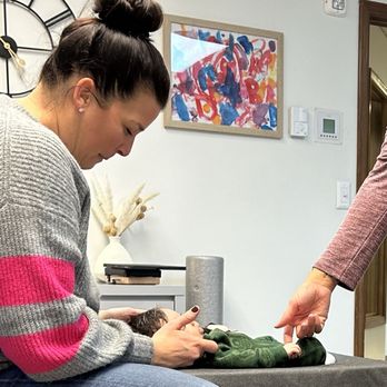 Innate Family Chiropractic - Dr. Ashley adjusting my 8-week-old son - Chiropractors Near Me - Woodinville, Washington Innate Family Chiropractic - Dr. Ashley adjusting my 8-week-old son - Chiropractors Near Me - Woodinville, Washington