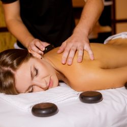Restorative Massages & Wellness - Clients love the deep stone massages provided by Restorative Massages & Wellness