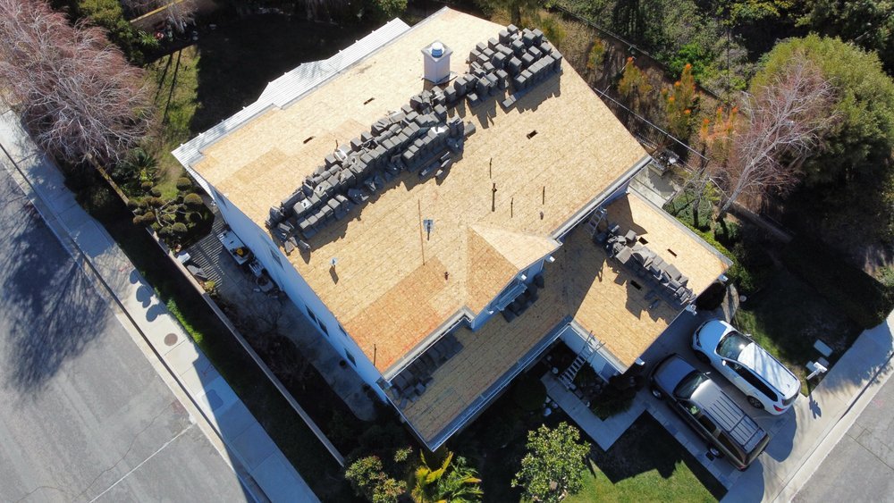 Slide of Superstar Roofing