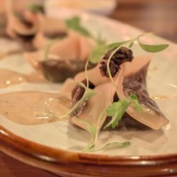 Kabooki Sushi - Sand Lake - Money Bags. $18. Duxelle dumplings, shiitake crema, truffle pate.