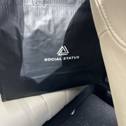 Social Status - White cement Air Jordan Retro 4