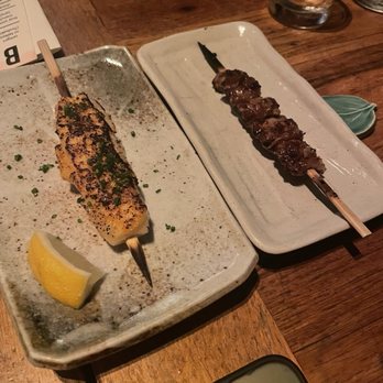 Tsubaki - Scallop skewer (left) and chicken skin skewer (right) - Izakaya Near Me - Los Angeles, California Tsubaki - Scallop skewer (left) and chicken skin skewer (right) - Izakaya Near Me - Los Angeles, California