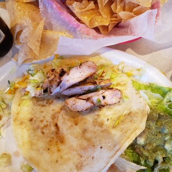 Chuy's - Chicken fajita taco with 3 pieces of gristly dark meat. Who would serve this as a taco? I wasn't so sure it was cooked all the way either. - Tex-Mex Near Me - Pasadena, Texas