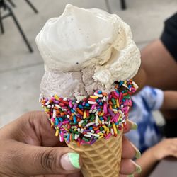 CRAVE Ice Cream Social - Sprinkle Cone Double Scoop with cookie dough and cookies and Cream! Add the Malt ball to keep the cone from running.