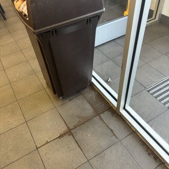Five Guys - Liquid dripping out of trash can - Burgers Near Me - Brighton, Michigan