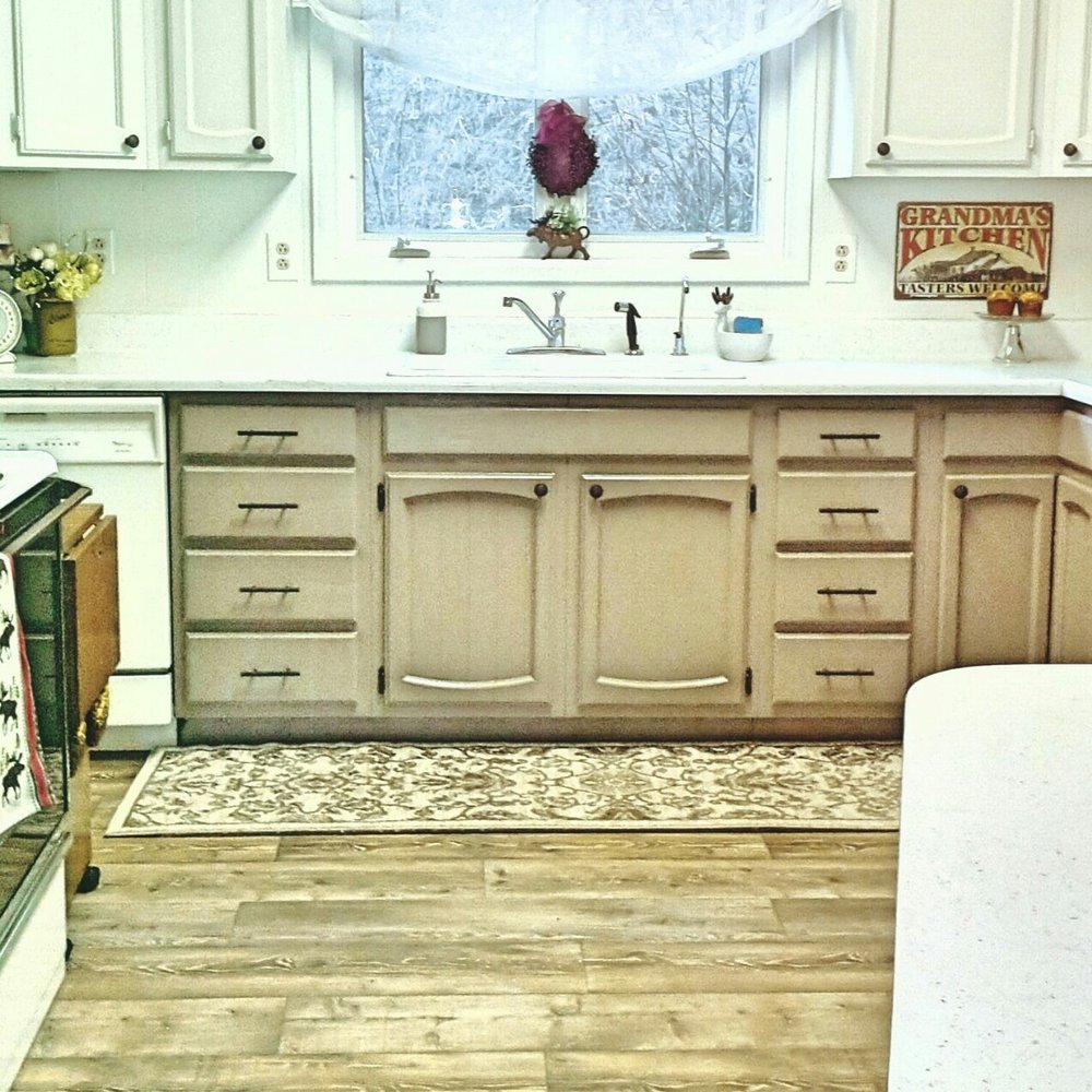 Timber Town Interiors - The kitchen is gorgeous and the flooring compliments the color of the cabinets. - Flooring Near Me - St Maries, Idaho Timber Town Interiors - The kitchen is gorgeous and the flooring compliments the color of the cabinets. - Flooring Near Me - St Maries, Idaho