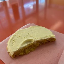 Eileen's Colossal Cookies - Half eaten lemon cookie with frosting