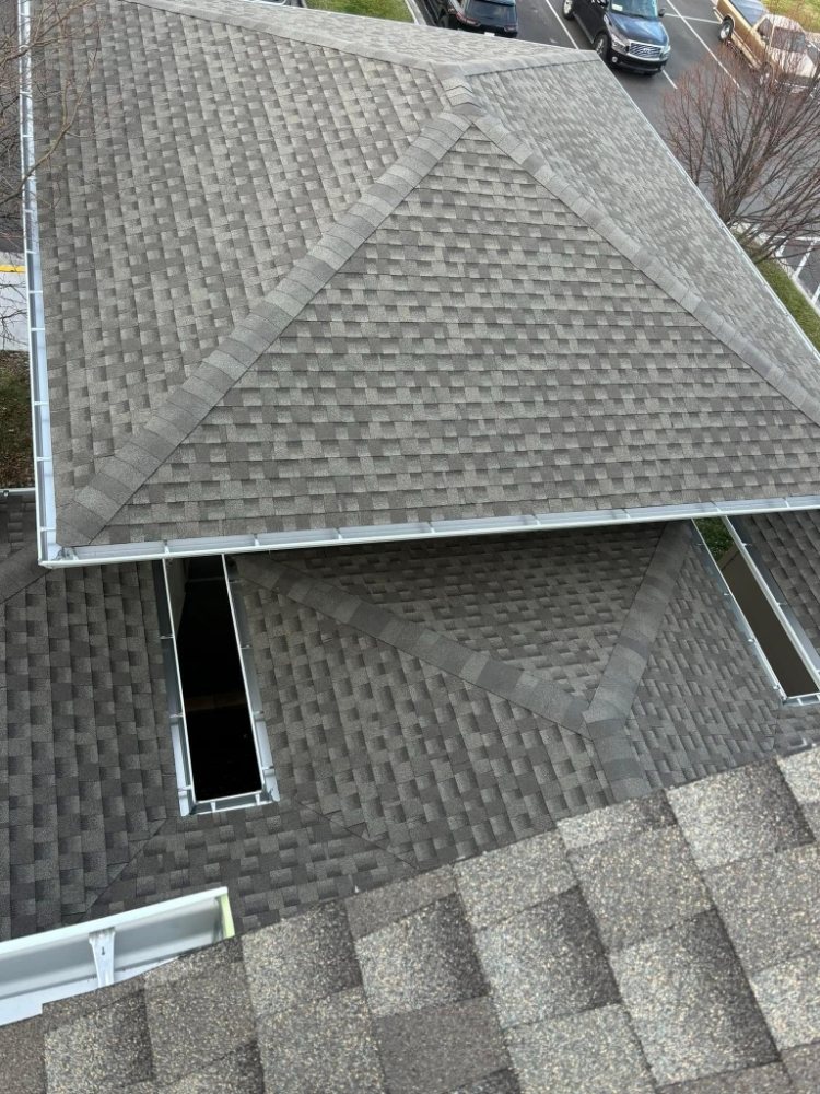 Slide of Triple GGG's Seamless Gutters