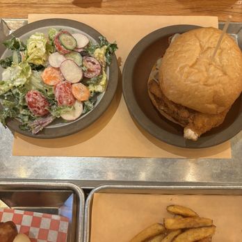 Wvrst - Chicken Schnitzel Sandwich and salad - German Near Me - Toronto, Ontario Wvrst - Chicken Schnitzel Sandwich and salad - German Near Me - Toronto, Ontario