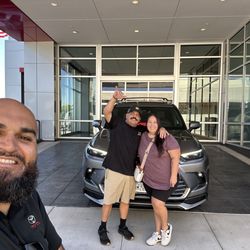 Kearny Mesa Toyota - Coolest sales guy around and happy new Grand Highlander owners!!