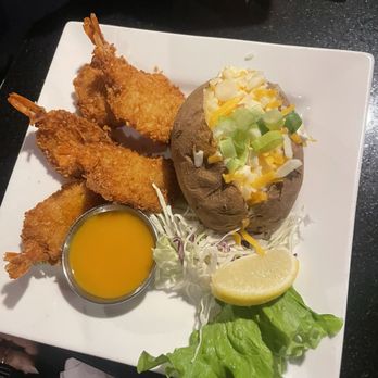 Eats Cafe Legendz Bar And Grill - Coconut shrimp with loaded baked potato - Breakfast & Brunch Near Me - Key West, Florida Eats Cafe Legendz Bar And Grill - Coconut shrimp with loaded baked potato - Breakfast & Brunch Near Me - Key West, Florida