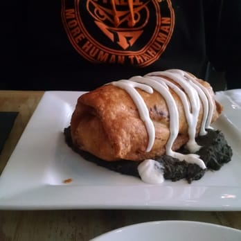 Black Sheep - Breakfast chimichunga with smokey black bean puree and lime crema - Wine Bars Near Me - Milwaukee, Wisconsin