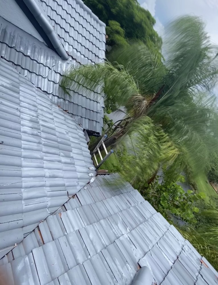 Slide of BL Florida Roofers