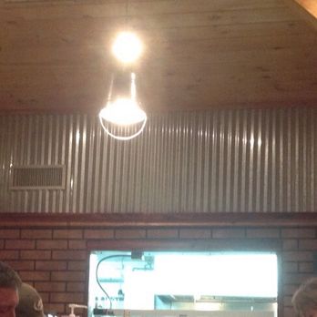 JR Steakhouse - Light fixture made from a pail, but you can also see the open kitchen. - Steakhouses Near Me - Eastview, Tennessee