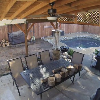 Prem Construction - a patio with a table and chairs - General Contractors Near Me - Sacramento, California Prem Construction - a patio with a table and chairs - General Contractors Near Me - Sacramento, California