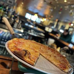 First & Last Tavern - Happy hour cheese pizza.