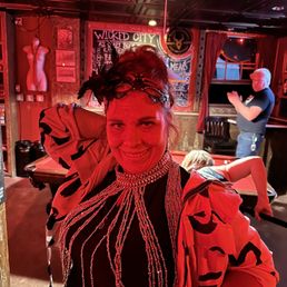 Here's my friend Chris trying on the bartender's beads!