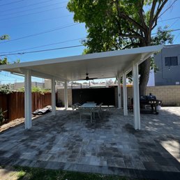 Pavers, back wall, and patio cover by EHD