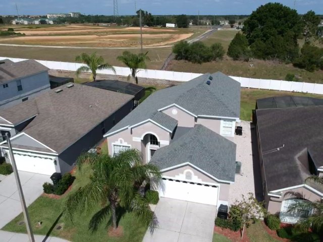 Slide of RC Roofing Florida