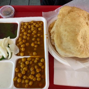 Raja Sweets & Fast Food - Chole batura. Batura are soft, chewy, and delicious. Chick peas were seasoned perfectly and the right amount of softness. - Indian Near Me - Jackson Heights, New York Raja Sweets & Fast Food - Chole batura. Batura are soft, chewy, and delicious. Chick peas were seasoned perfectly and the right amount of softness. - Indian Near Me - Jackson Heights, New York