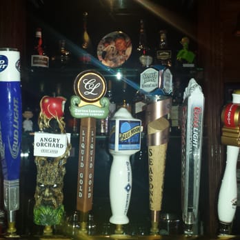 Bases Loaded - a row of beer taps - Sports Bars Near Me - Bronx, New York