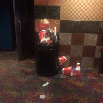 Century 14 - Trash cans overflowing with trash. This can was like this from beginning of movie until the end of movie - Cinema Near Me - Salinas, California