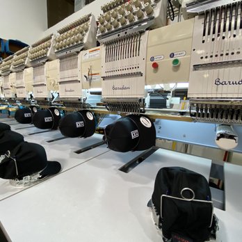 Industry Print Solutions - Hats being embroidered - Printing Services Near Me - Scottsdale, Arizona Industry Print Solutions - Hats being embroidered - Printing Services Near Me - Scottsdale, Arizona