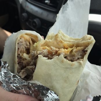 King Master Grill - Burritotripleta stuffed with 3 meats (beef, chicken, & ham) - Food Trucks Near Me - Kissimmee, Florida King Master Grill - Burritotripleta stuffed with 3 meats (beef, chicken, & ham) - Food Trucks Near Me - Kissimmee, Florida