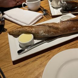 Warm baguette and butter Warm baguette and butter