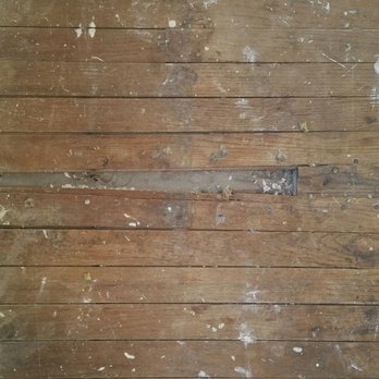 Exquisite Hardwood - Water damaged boards that needed replacing - Flooring Near Me