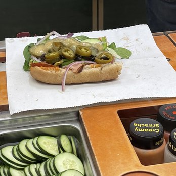 Subway - a sandwich with pickles, cucumbers, and mustard - Sandwiches Near Me - Baker, California Subway - a sandwich with pickles, cucumbers, and mustard - Sandwiches Near Me - Baker, California