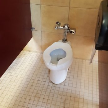 Lindy's Landing Market - a toilet in a stall - Grocery Near Me - Reedley, California Lindy's Landing Market - a toilet in a stall - Grocery Near Me - Reedley, California