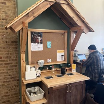 The Build Chicago - Custom cedar, walnut, and butcher block trailhead style condiment bar and trash depository. - Interior Design Near Me - Chicago, Illinois