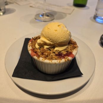 Tin Roof Bistro - Mango and cherry fruit crisp with mango ice cream - New American Near Me - Manhattan Beach, California Tin Roof Bistro - Mango and cherry fruit crisp with mango ice cream - New American Near Me - Manhattan Beach, California
