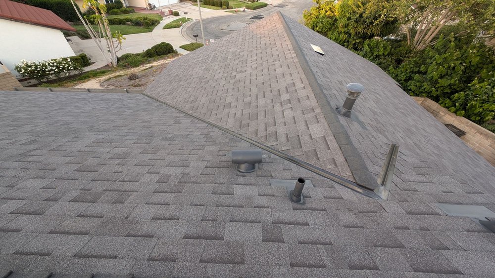 Slide of One Stop Roofing