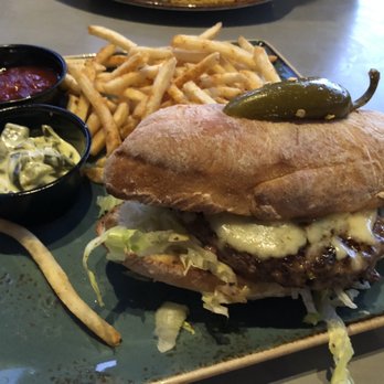 Tio Taco + Tequila Bar - Burger with bun baked at the restaurant, yum!! - Mexican Near Me - Marlboro, New Jersey Tio Taco + Tequila Bar - Burger with bun baked at the restaurant, yum!! - Mexican Near Me - Marlboro, New Jersey