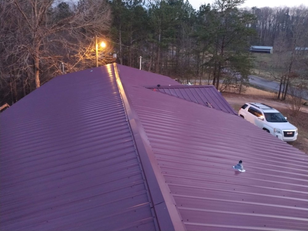 Slide of Adkins Roofing