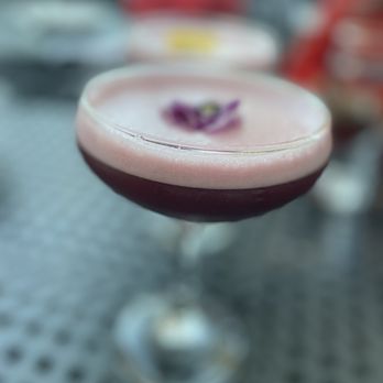 In Bloom - a close up of a purple cocktail - New American Near Me - Paso Robles, California