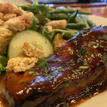 The Angry Goat Pub & Kitchen - BBQ Salmon with sides of a salad and green beans - Pubs Near Me - Ogden, Utah