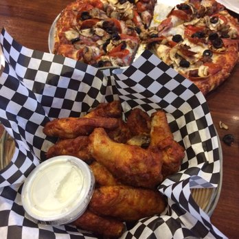Mountain Mike's Pizza - A medium The Everest and an order of 12 Buffalo hot wings. - Pizza Near Me - Hollister, California