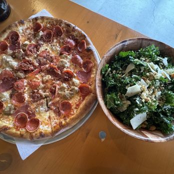 Larrabee Lager - Pepperoni and sausage pizza with a kale Caesar salad. - Salad Near Me - Bellingham, Washington Larrabee Lager - Pepperoni and sausage pizza with a kale Caesar salad. - Salad Near Me - Bellingham, Washington