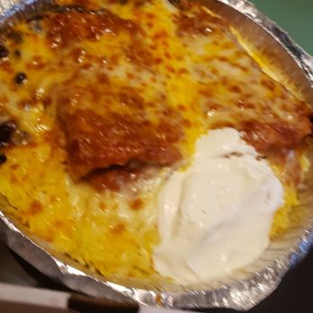 Tres Amigos Mexican Grill - a pizza with cheese and sauce - Mexican Near Me - Greenlawn, New York