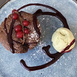 La Cassolette - Ooooh, this dessert! Chocolate lava cake (so warm and gooey inside!), with current sauce plus pistachio ice cream.