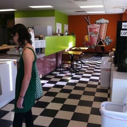 Nice eating area if you want to stay in. And, yes, that is a cop on his IPhone. I think he is trying to Yelp!
