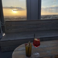 Überland - Drinks on the upstairs terrace at sunset