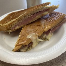 Look at that beautiful Cuban sandwich just oozing goodness. Look at that beautiful Cuban sandwich just oozing goodness.