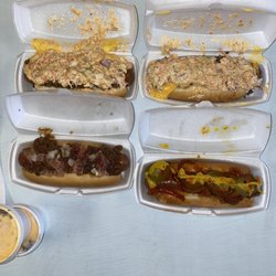 Slaw Dogz - Famous Slaw Dog (top left and right)  The Poor Boy (bottom left)  India's Dream (bottom right)