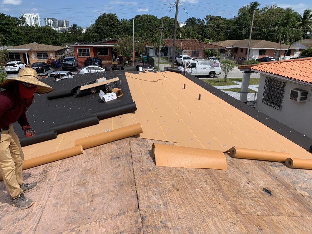 Slide of PH Roofing Remodeling